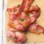 Air fryer bacon on a chopping board