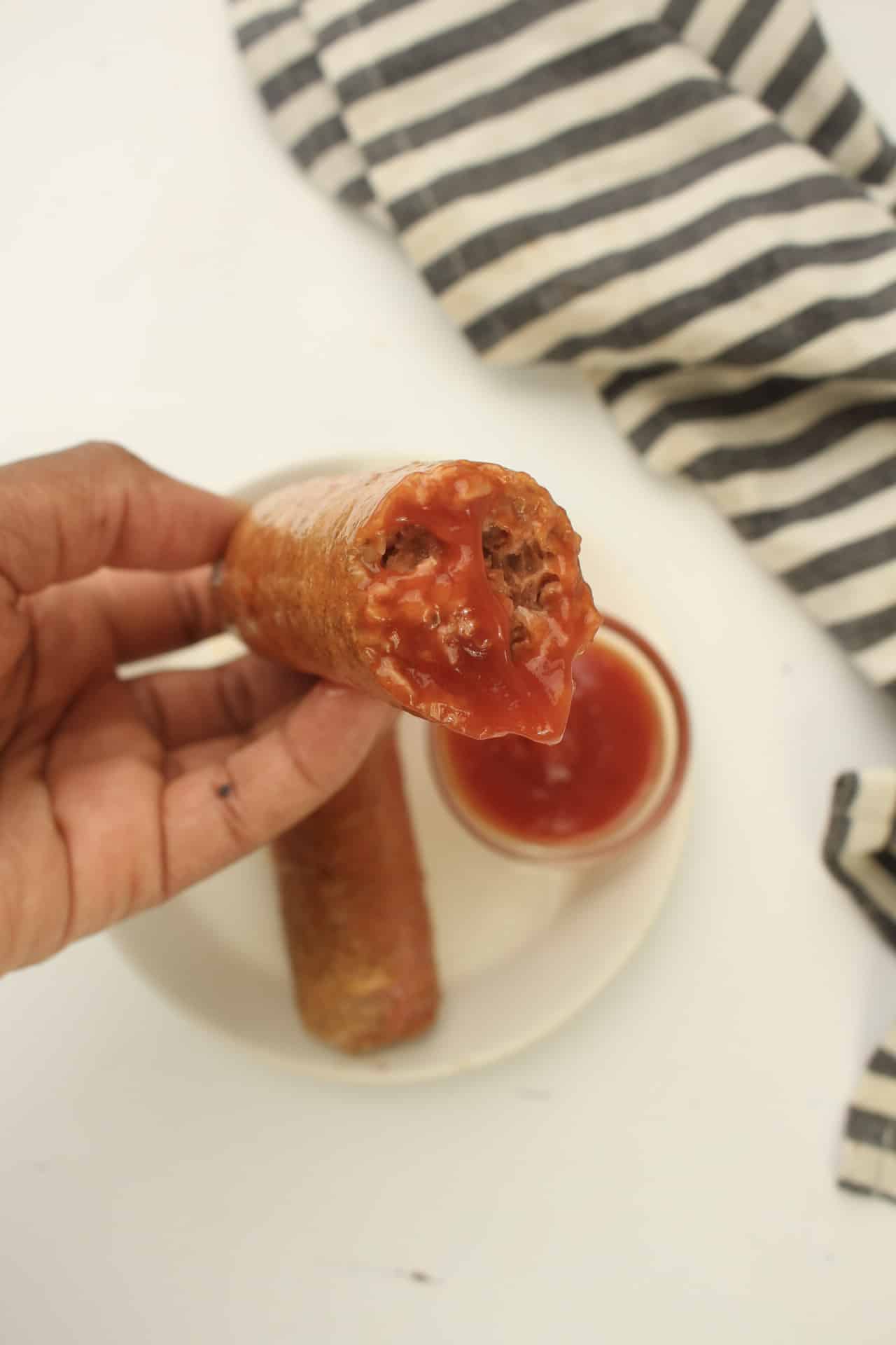 Air fryer Beyond Sausage with ketchup