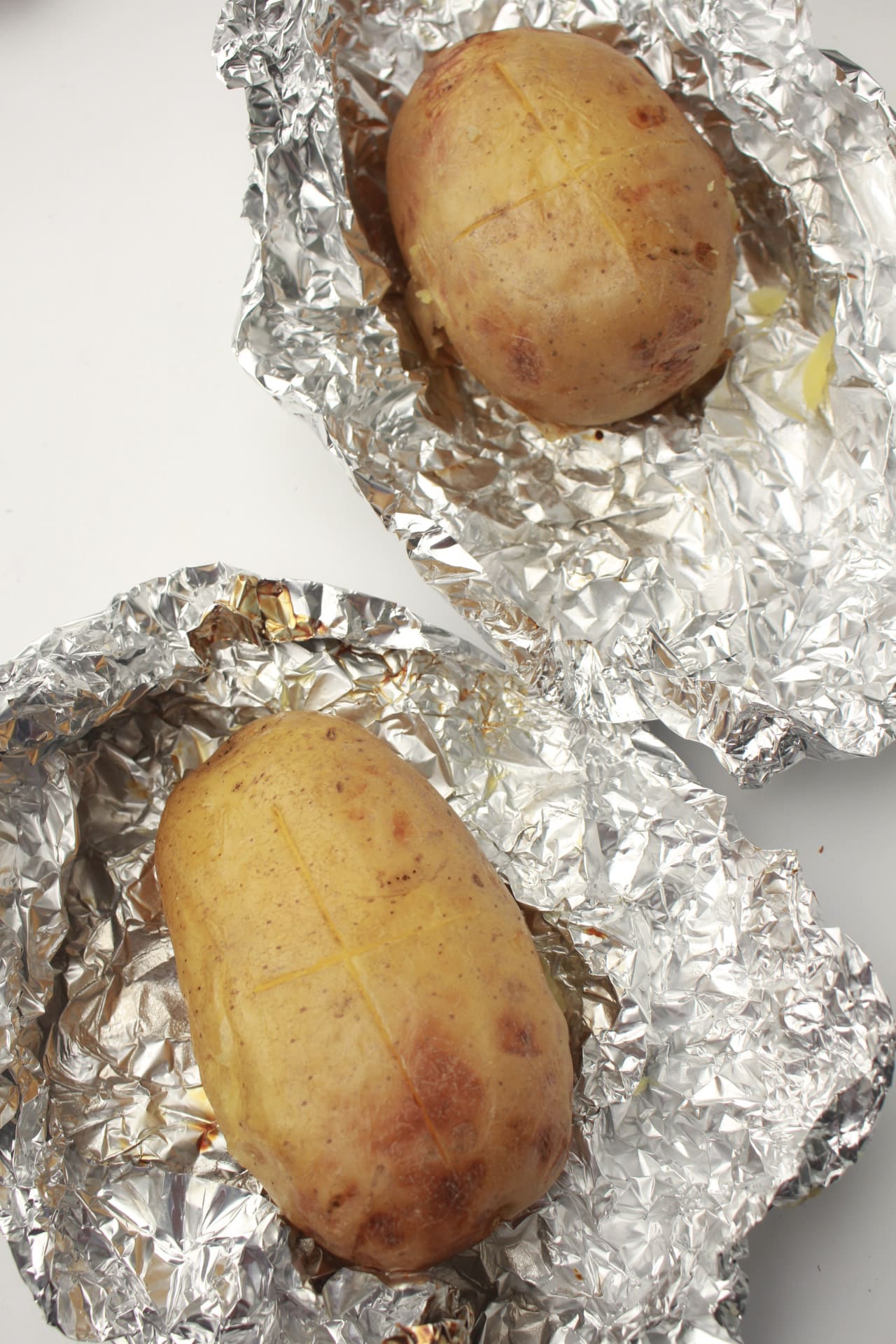 How long to bake potatoes at 375 in foil