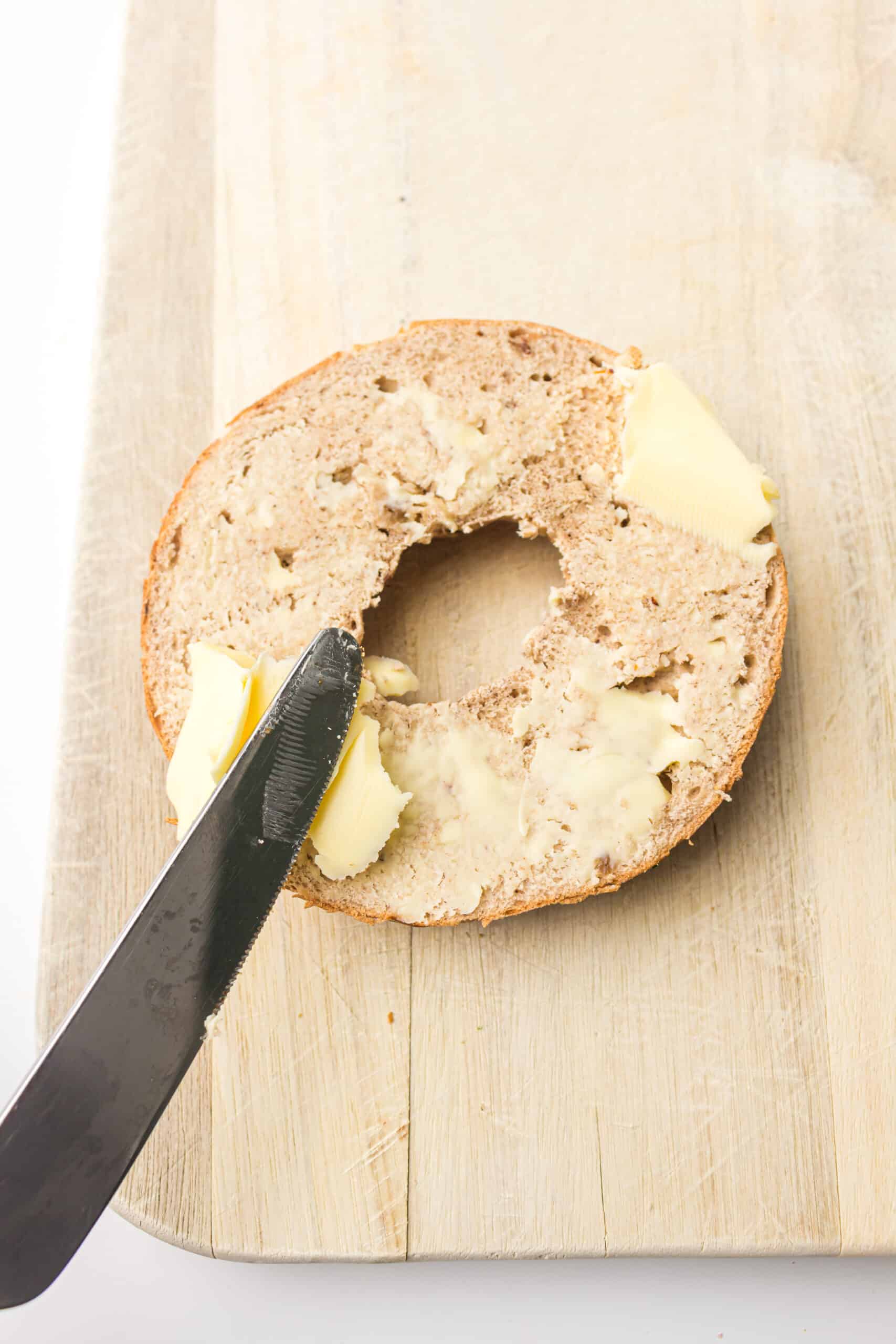 Buttering the bagel

