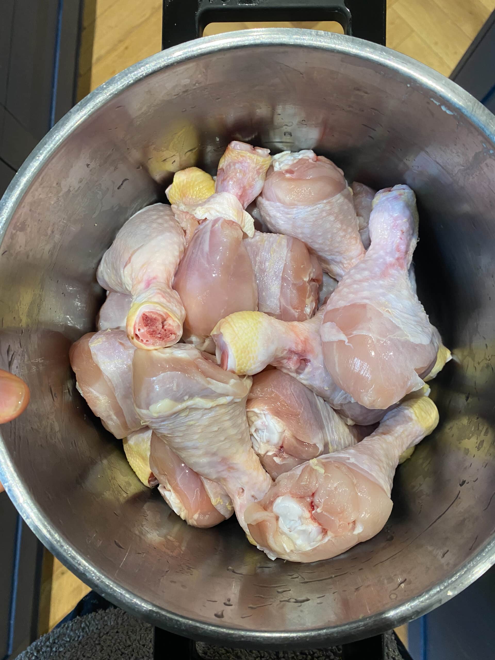 Raw chicken in the pot 