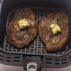 Air Fryer Steaks with Herbed Butter