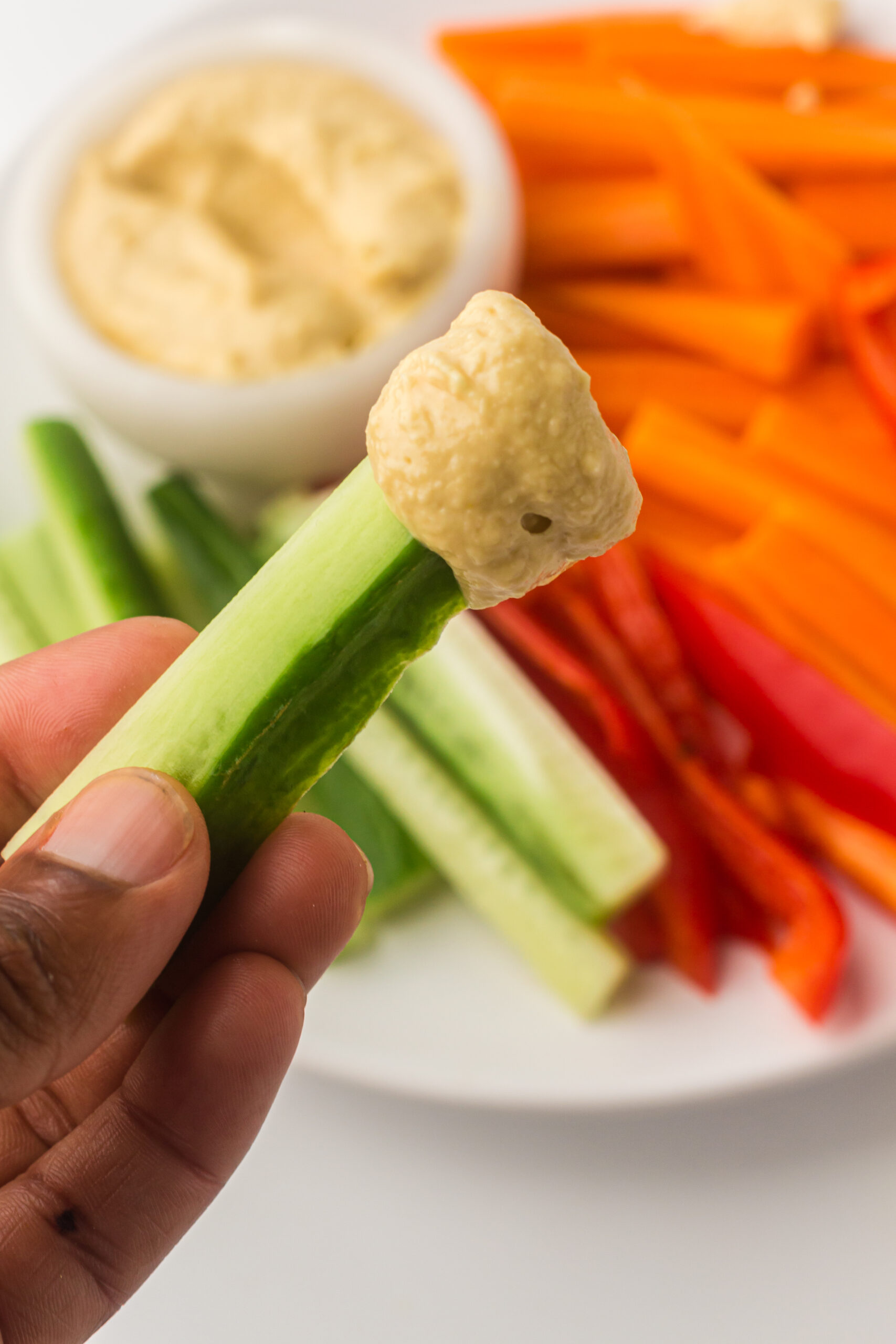 Crunchy Vegetable Sticks and Creamy Hummus Snack: A Healthy Delight for All Ages