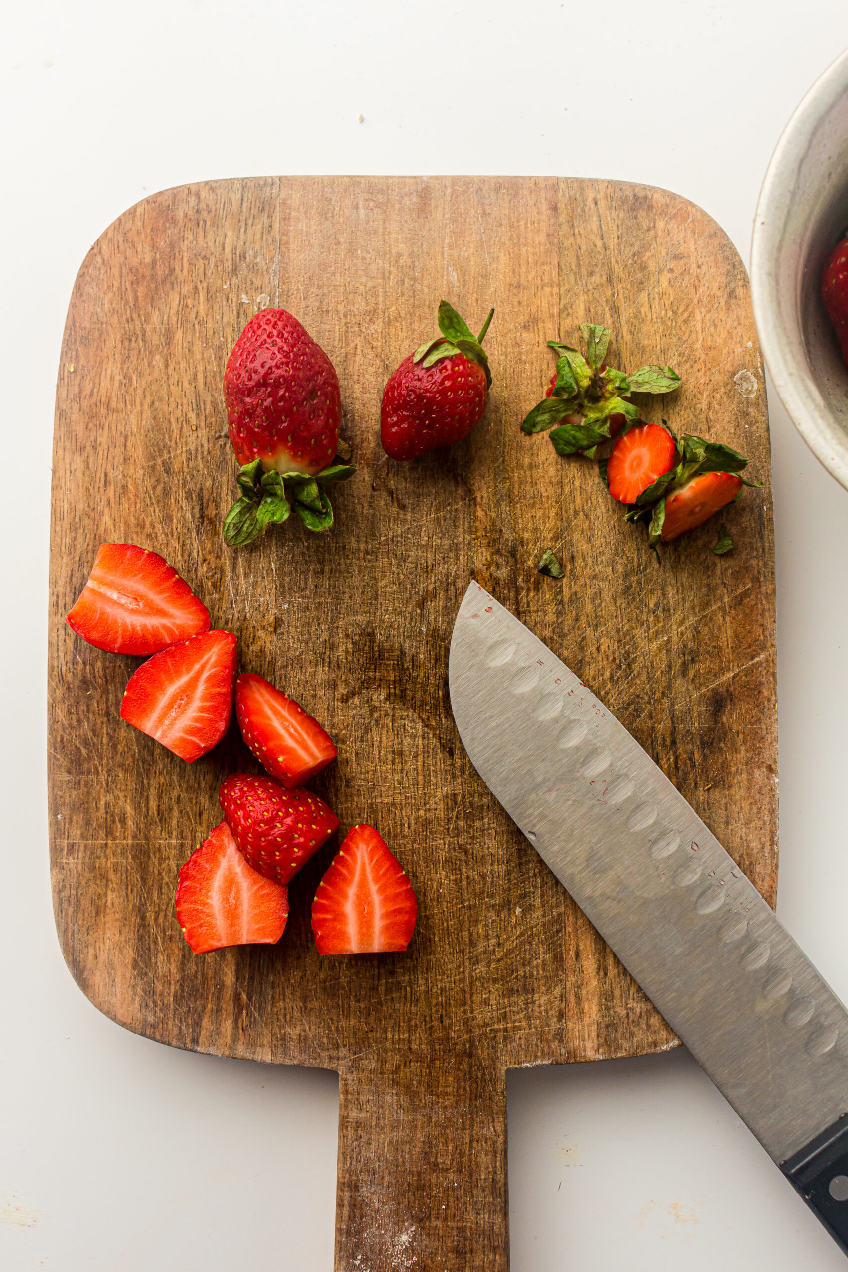 Prep the strawberries and slice them 